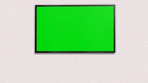 TV with green screen is switched on with remote control Video stock 73293158