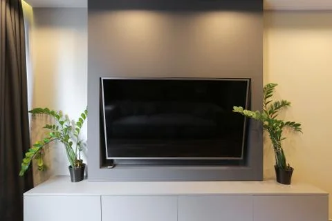 TV hanging on the wall Stock Photos