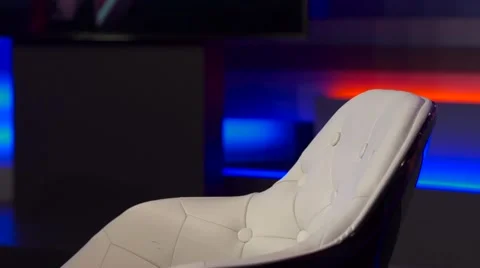 The TV Host Corrects Papers On a Table Before Broadcast Video stock 68341017