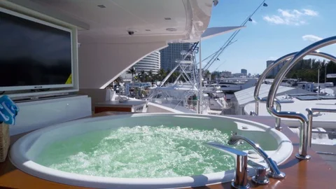 TV In Jacuzzi On Yacht Stock Footage 129625662