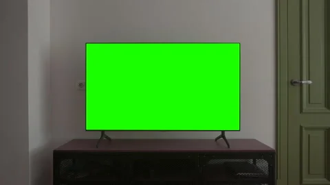 TV mockup screen. LSD smart TV screen with a blank green background in the livin Stock Footage 150866966