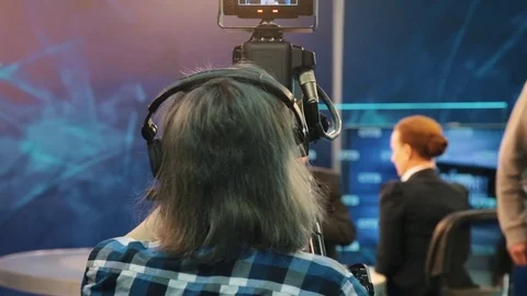 TV operator install video camera for shooting Video stock 75950348