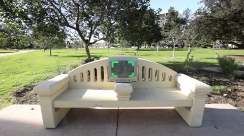 TV ON PARK BENCH Stock Footage 5391969