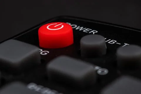 TV power button on the remote control on black background 写真素材