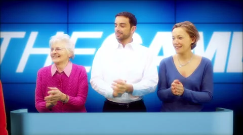 A TV presenter and his game show guests battle it out. Who will be the winner? Stock Footage