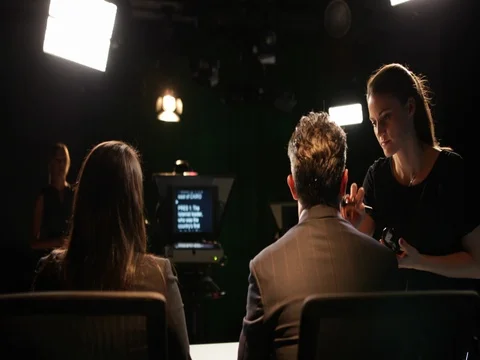 TV presenter having make-up applied on set Stock Footage 82127808