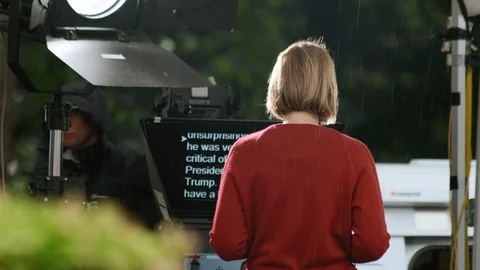 TV Presenter Reads Teleprompter Stock Footage