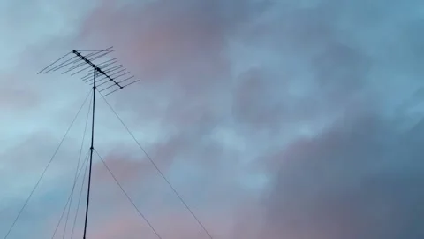 TV reception antenna at sunset Stock Footage 232350817