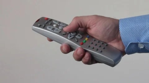 TV remote and hand Stock Footage 85921386