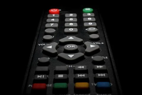 TV remote control on a black background close-up Stock Photos