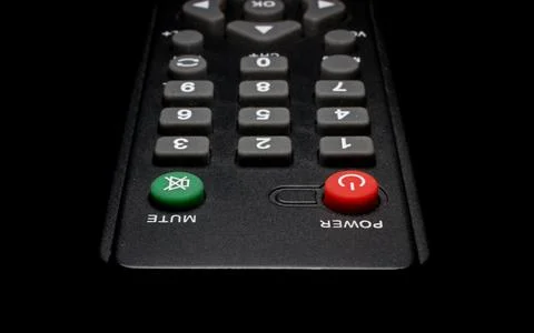 TV remote control on a black background close-up Stock Photos