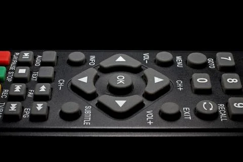 TV remote control on a black background close-up Foto stock