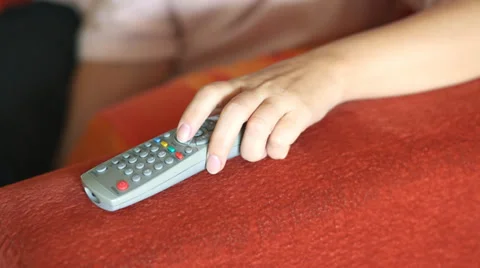 TV Remote control device using - closeup Stock Footage 35880710