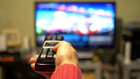 TV remote control. Flipping channels. Stock Footage 226772349
