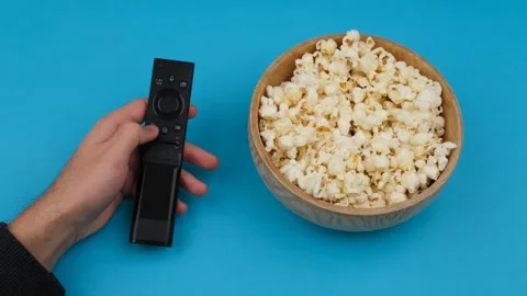 Tv remote controller and popcorn Stock Footage 260163184