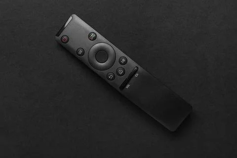 TV remote controller on black background 库存照片