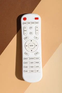 TV remote controller on color background, top view 库存照片