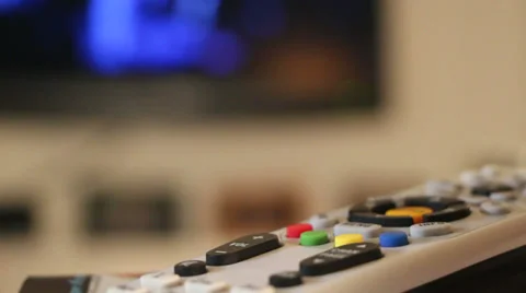 TV Remote In Front of Television Stock Footage 38036251