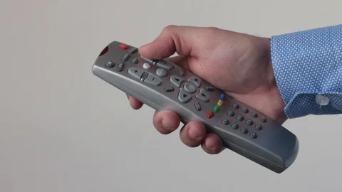TV remote in hand Stock Footage 85921382