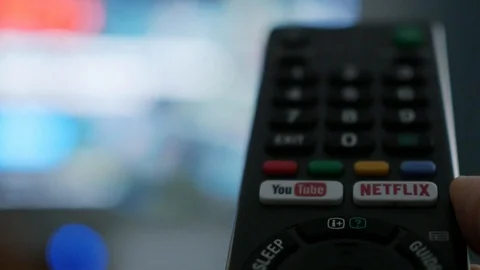 Tv remote with netflix youtube button Stock Footage 120727222