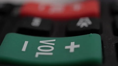 TV Remote Rack Focus: VOLUME- Long Clip, Multiple Shots Stock Footage 220313574
