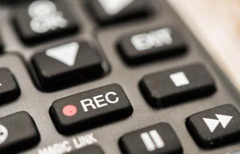 TV remote with recording button. Concept of show business, recording, and radio. Stock Photos
