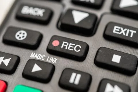 TV remote with recording button. Concept of show business, recording, and radio. Stock Photos
