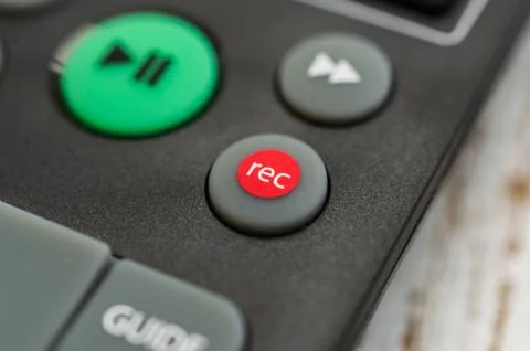 TV remote with recording button. Concept of show business, recording, and radio. Stock Photos