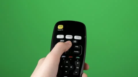 TV remote shot on green screen Stock Footage 21995338