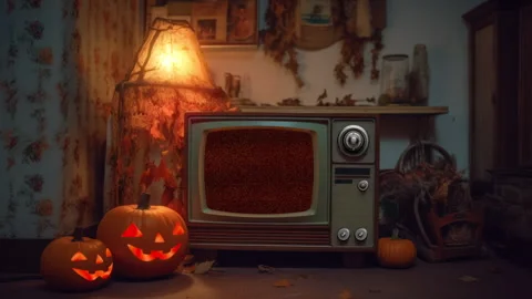 Tv with screen interference, halloween, pumpkins, flickering lamp, autumn Stock Footage 241092468