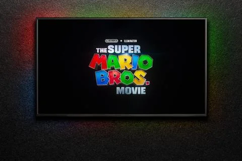 TV screen playing The Super Mario Bros. Movie trailer or movie. TV on black t Stock Photos