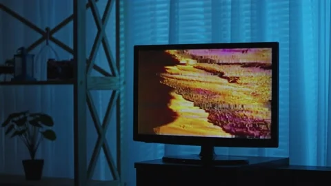 TV set with background damage and image glitch. Distorted horizontal lines Stock Footage 169498987
