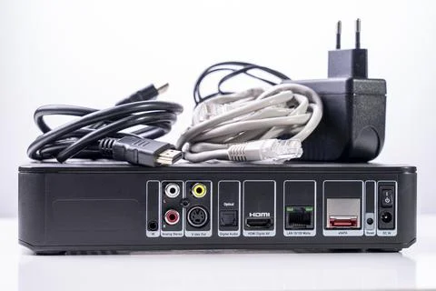 TV set-top box prepared for installation, digital TV kit on white background Stock Photos