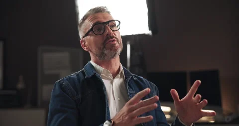 TV show, interview and man on set for filming with documentary, press or movie Stock Footage 303540696