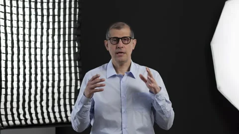 TV show, interview and man on set for filming with documentary Видео 332678113