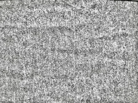 Tv static noise creates intense black and white abstract texture pattern with Stockfoto's