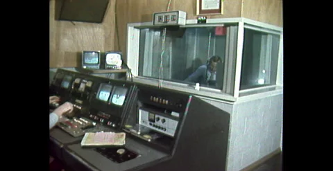 TV Studio Control Room with Booth Announcer – Canberra (1974) Stock Footage 310169447