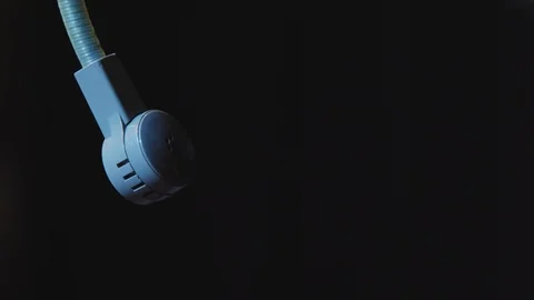 Tv studio intercom headset on black background Stock Footage 89500911