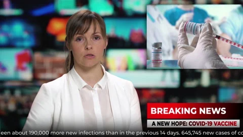 TV studio news presenter talking breaking news about coronavirus and vaccination Stock Footage 161033416