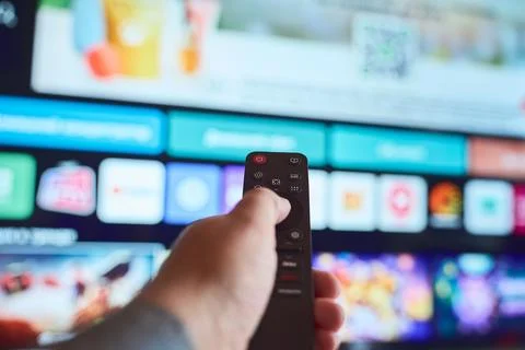 TV time with a remote Stock Photos