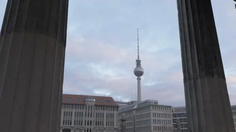 TV tower of Berlin framed in two archaic pillars during beautiful sunset Video stock 168437833