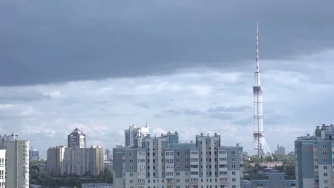 TV tower in the city. Clouds floating in the sky on a sunny day Stock Footage 121117069