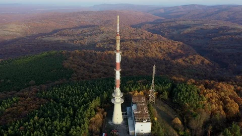 Tv tower on hill at sunset 스톡 동영상 119689186