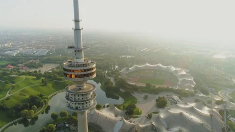 TV tower Munich at sunrise morning sun flying on the Copter Stock Footage