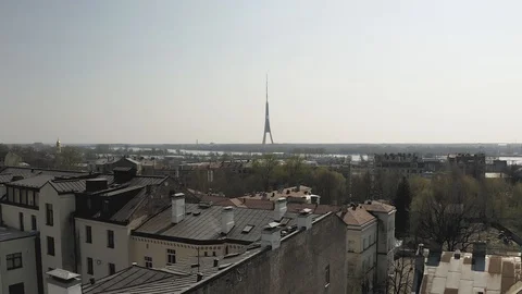 TV tower in Riga city, Drone flight, buildings living houses, block of flats and Stock Footage 120399554