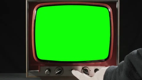 TV vintage hand turn on off green Stock Footage