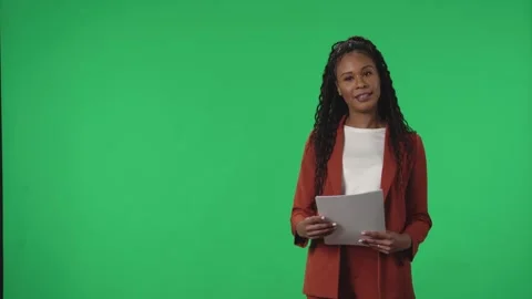 TV Weather Forecast Program. African American woman meteorologist pointing at 스톡 동영상 244815460