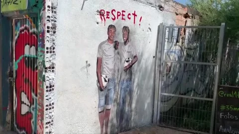 TVBoy paints mural calling for respect for Lamine Yamal and Nico Williams, Barce Stock Footage 279073447