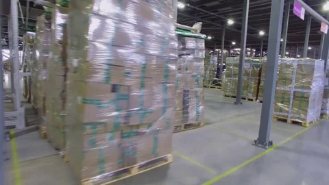TVER - MAY 17, 2017: Many stacks with parcels in Ozon company storage hangar Stock Footage 82682664