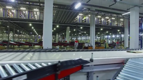 TVER - MAY 17, 2017: Parcel moves on conveyor in Ozon company warehouse Stock Footage 82682632